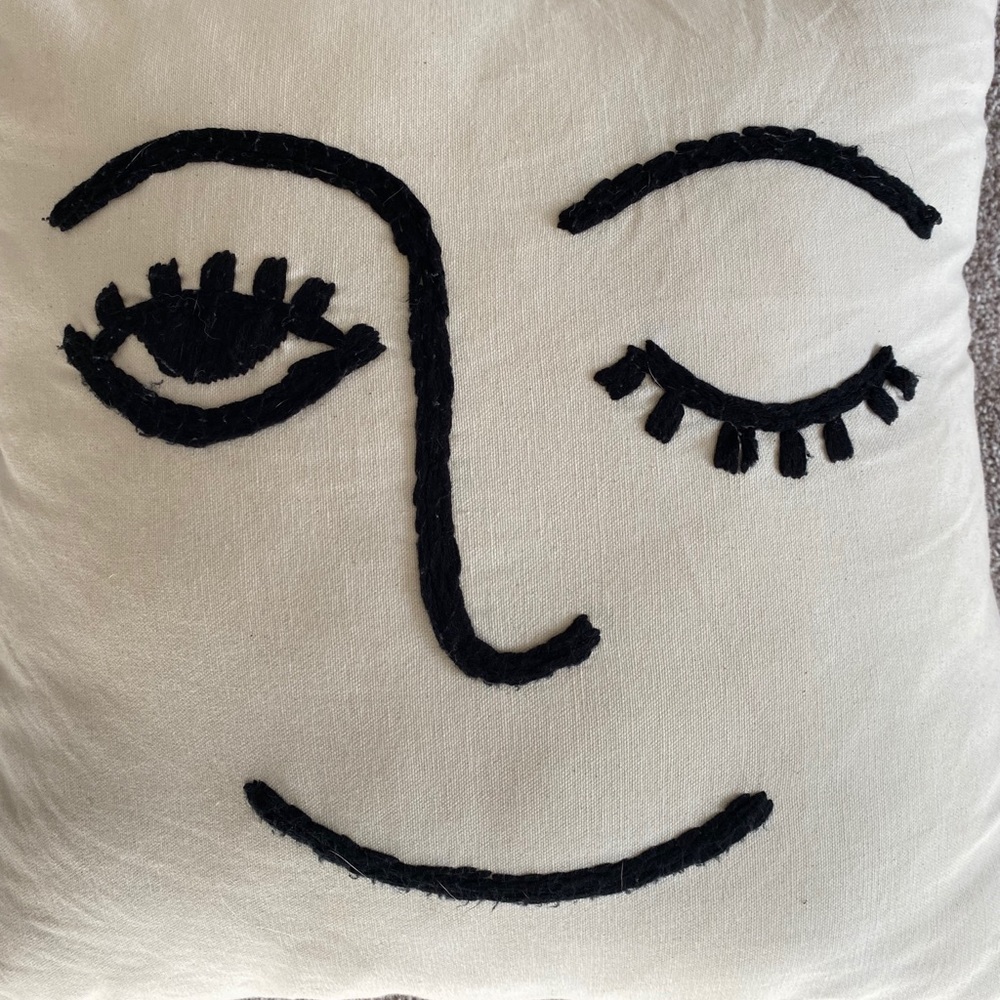 Urban Outfitters Winky Embroidered Pillow